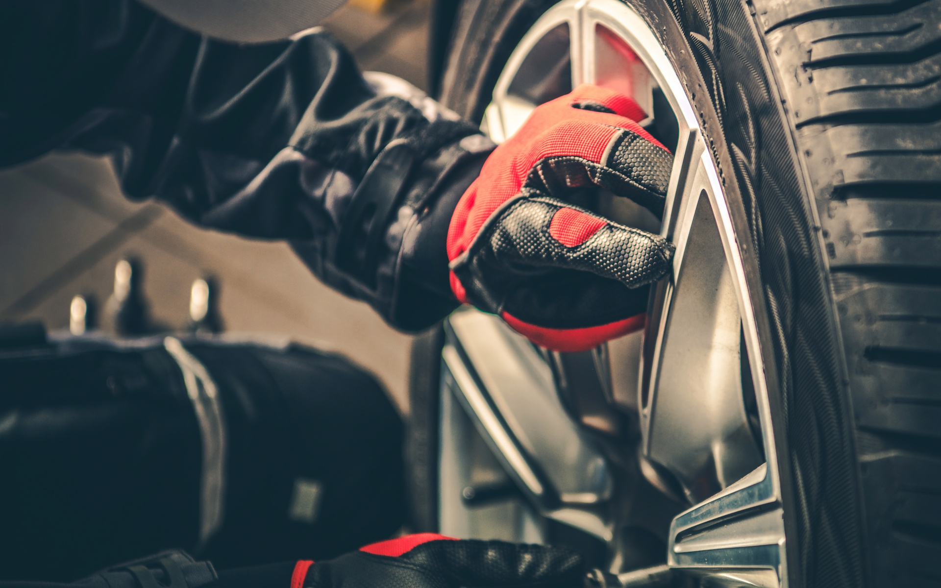 Seasonal Tires Replacement:wheel,tire,change,seasonal,season,replacement,driving,maintenance,new,repair,balancing,rotation,car,vehicle,men,worker,car service,vulcanization,vulcanize,transport,transportation,industry,mechanical,wrench,tool,equipment,screw,bolts,alloy wheel,horizontal,closeup,drive